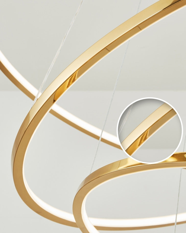 Detail of the mirror-polished gold frame and integrated acrylic LED diffuser, designed to produce a seamless line of soft light.