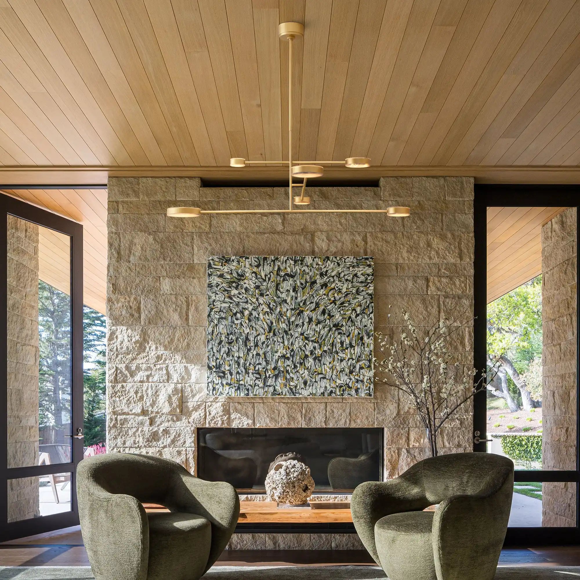 Alexander Mobile Chandelier 46" illuminating a modern living room