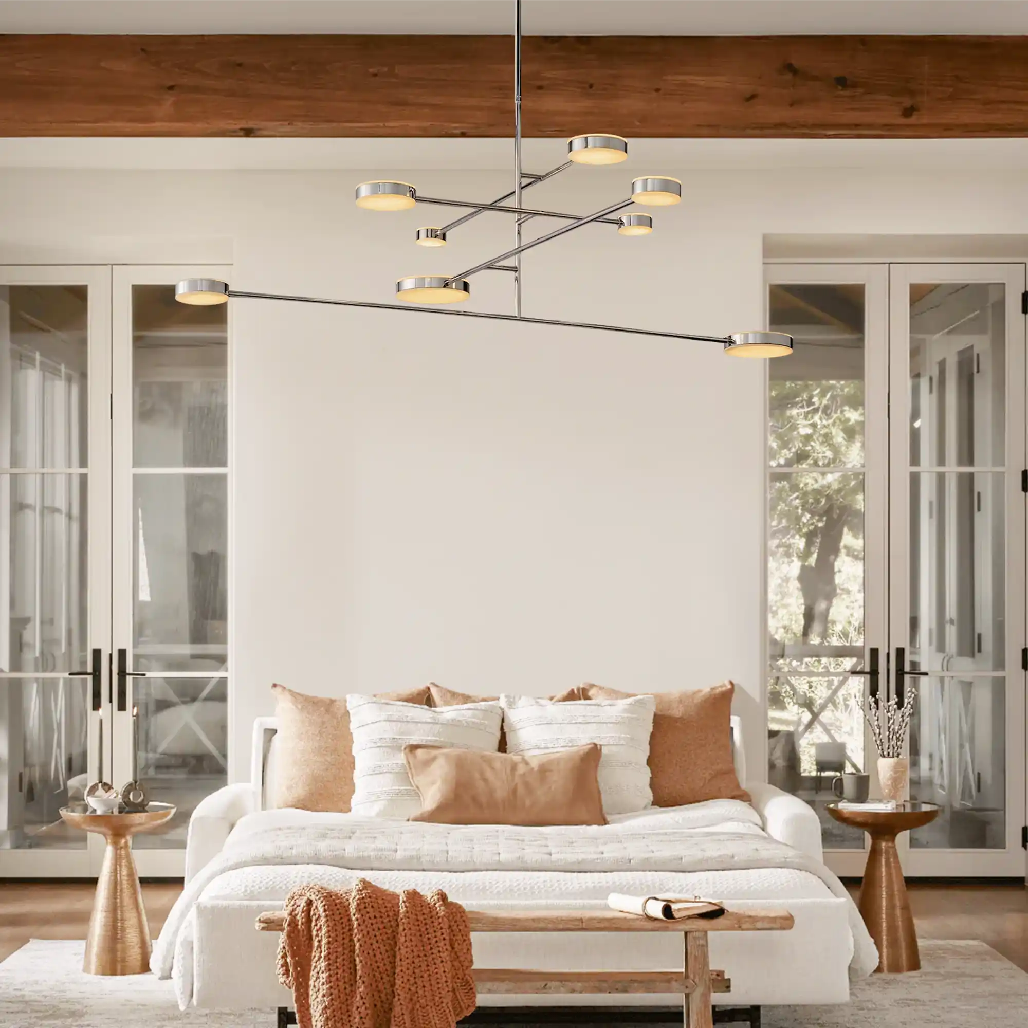 Soft ambient glow from the Alexander Mobile Chandelier 60" in a relaxing bedroom setting