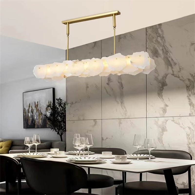Carlos Alabaster Modern Snowflake Linear Chandelier Over Dining Table - Blushlighting