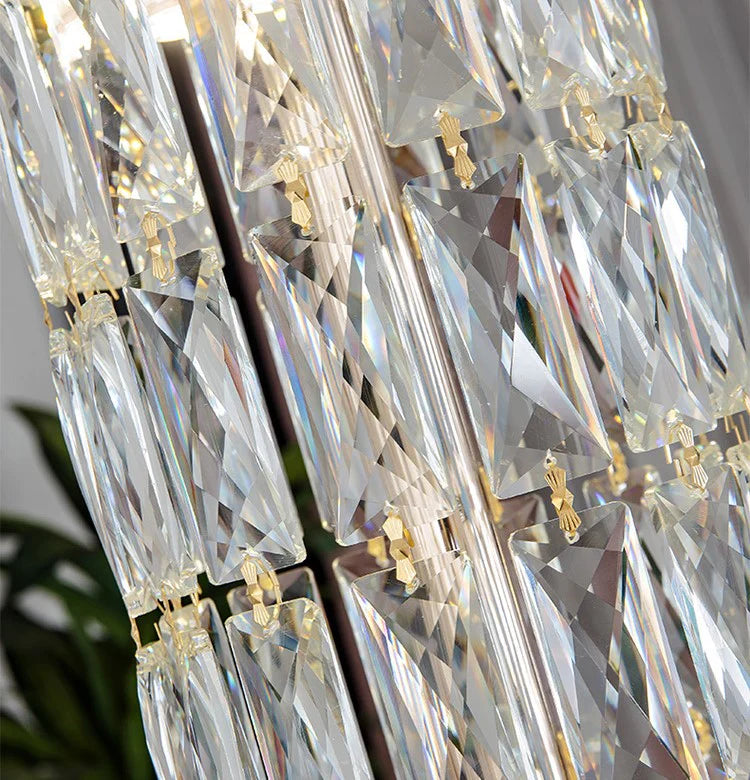 Chandelier crystal pieces reflecting warm light