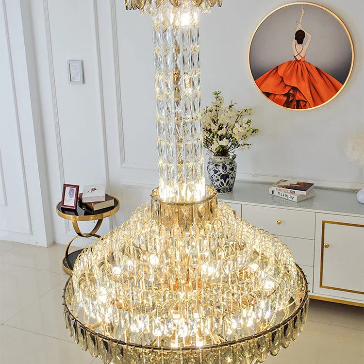 Elegant crystal chandelier illuminating a hotel-style foyer