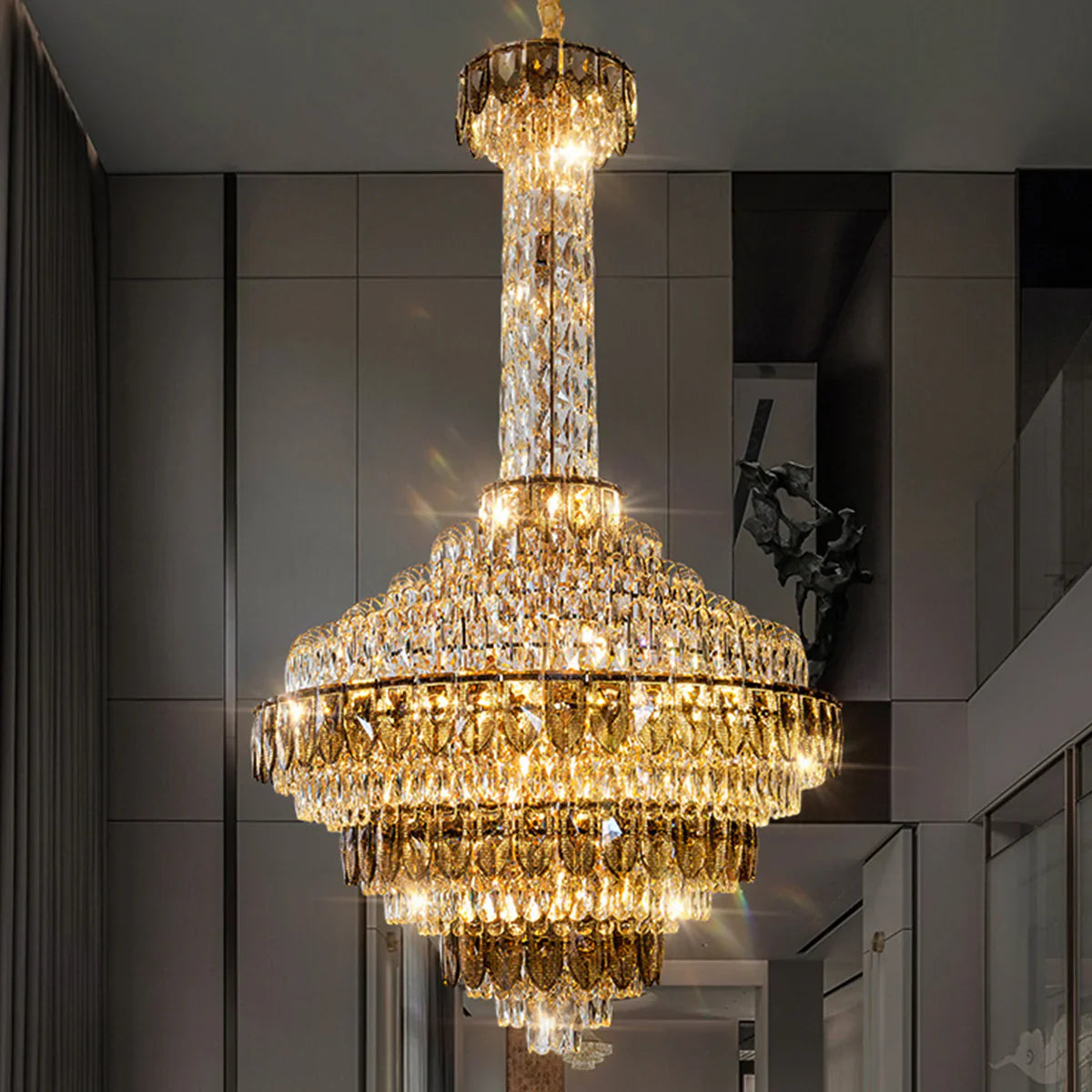 Large empire crystal chandelier installed in a grand foyer