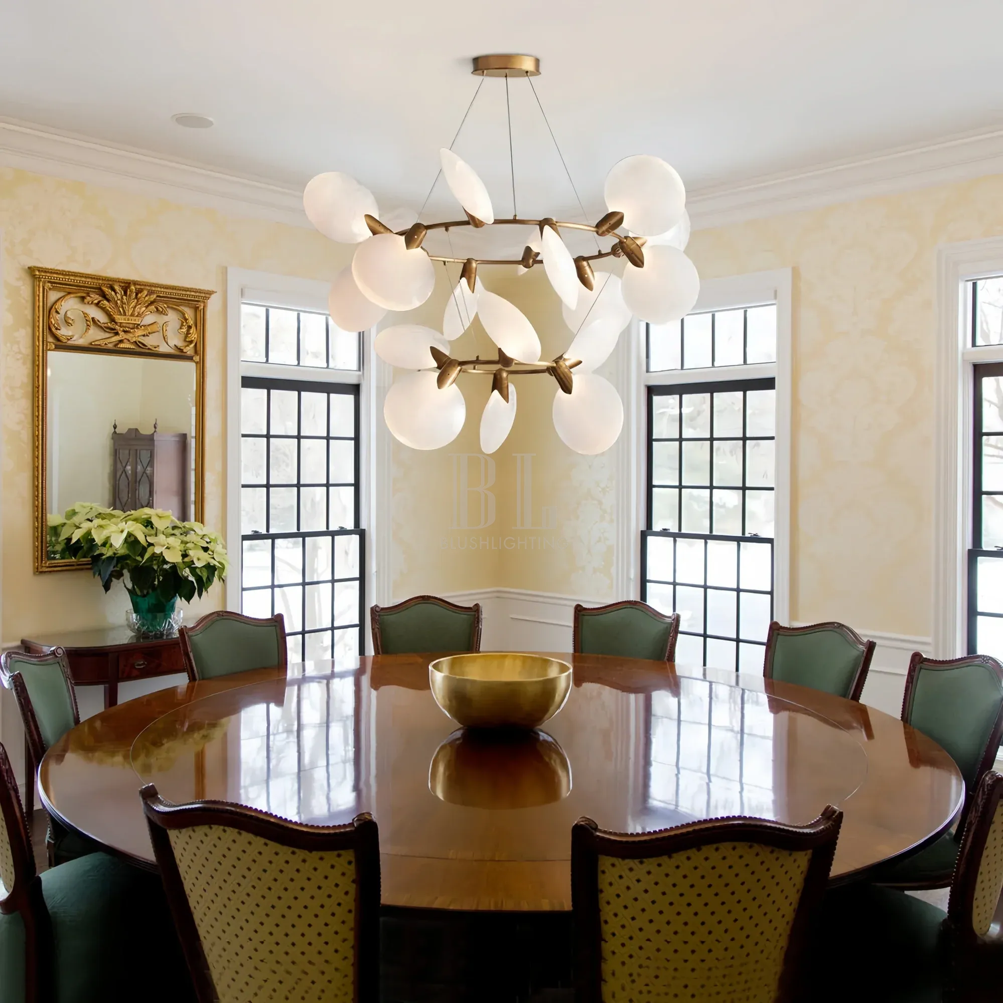 Dining room illuminated by Lyla 2-Tiered Halo Chandelier with soft ambient lighting