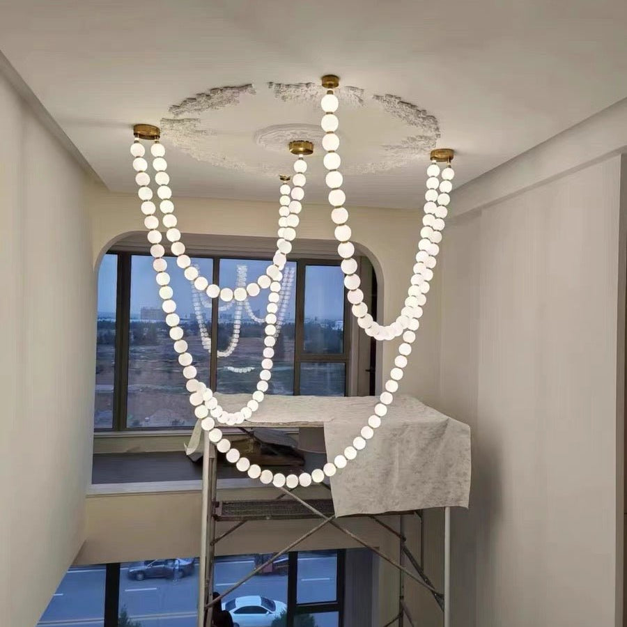 Modern Creative Pearl Necklace Chandelier - 12 Pearls/L78.7"With Metal DividerWarm LightBlushlighting