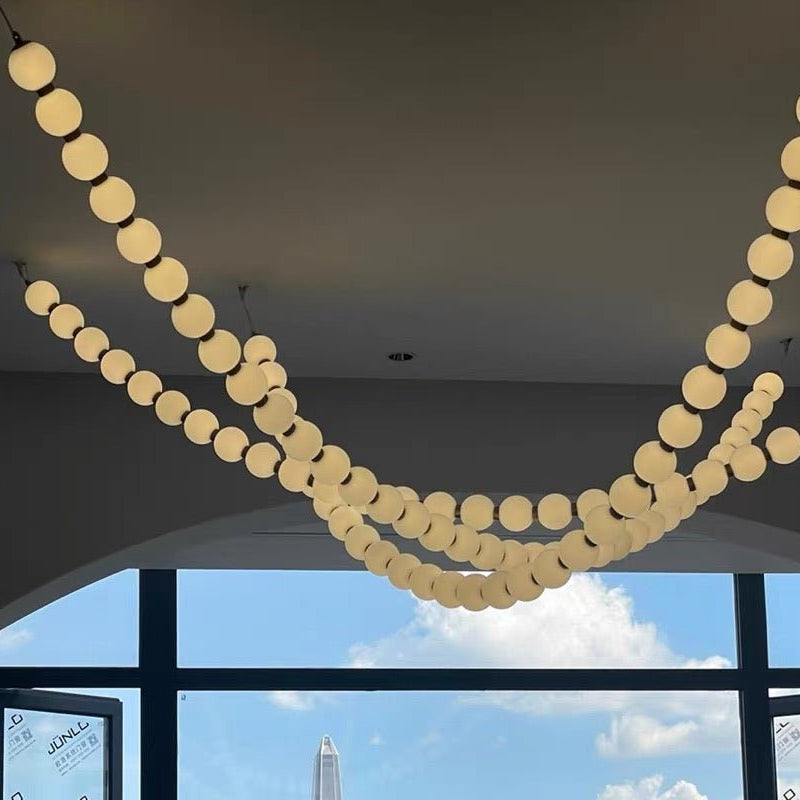 Modern Creative Pearl Necklace Chandelier - 12 Pearls/L78.7"With Metal DividerWarm LightBlushlighting