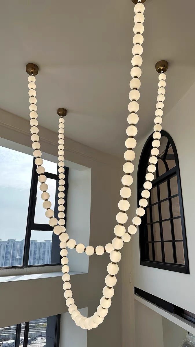 Modern Creative Pearl Necklace Chandelier - 12 Pearls/L78.7"With Metal DividerWarm LightBlushlighting