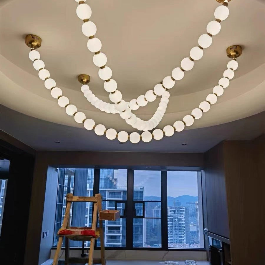 Modern Creative Pearl Necklace Chandelier - 12 Pearls/L78.7"With Metal DividerWarm LightBlushlighting