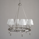 Chandelier with white lampshades on a gray background
