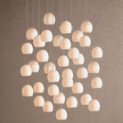 Arica Round Alabaster Chandelier Light in white by Blush Lighting