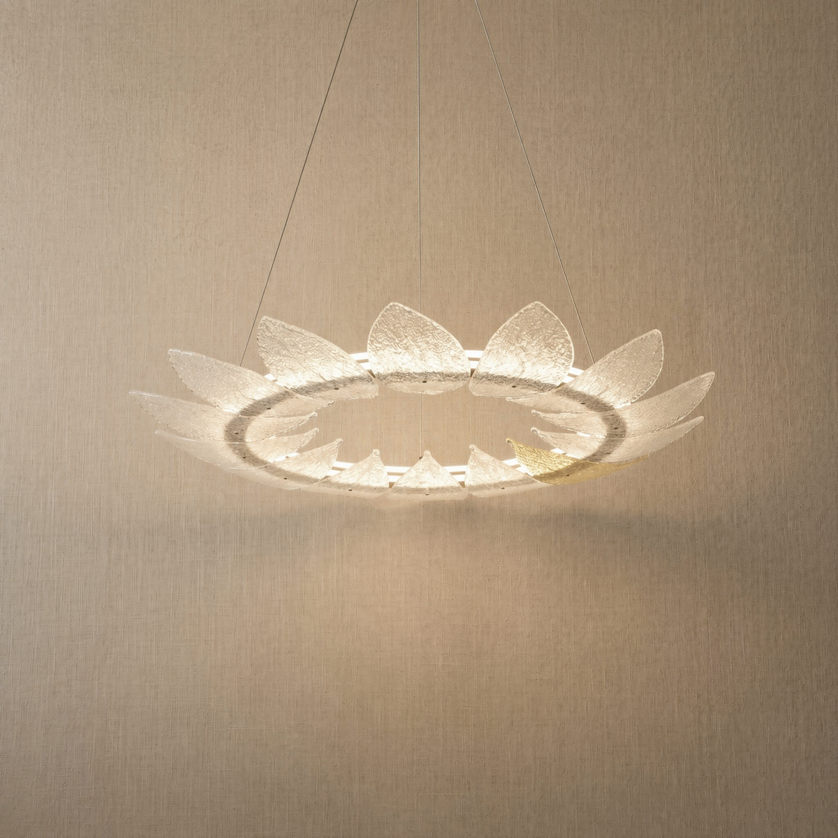 Detail of the sculpted metal with champagne gold finish