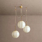 Agnes Chandelier in brass - dining room lighting