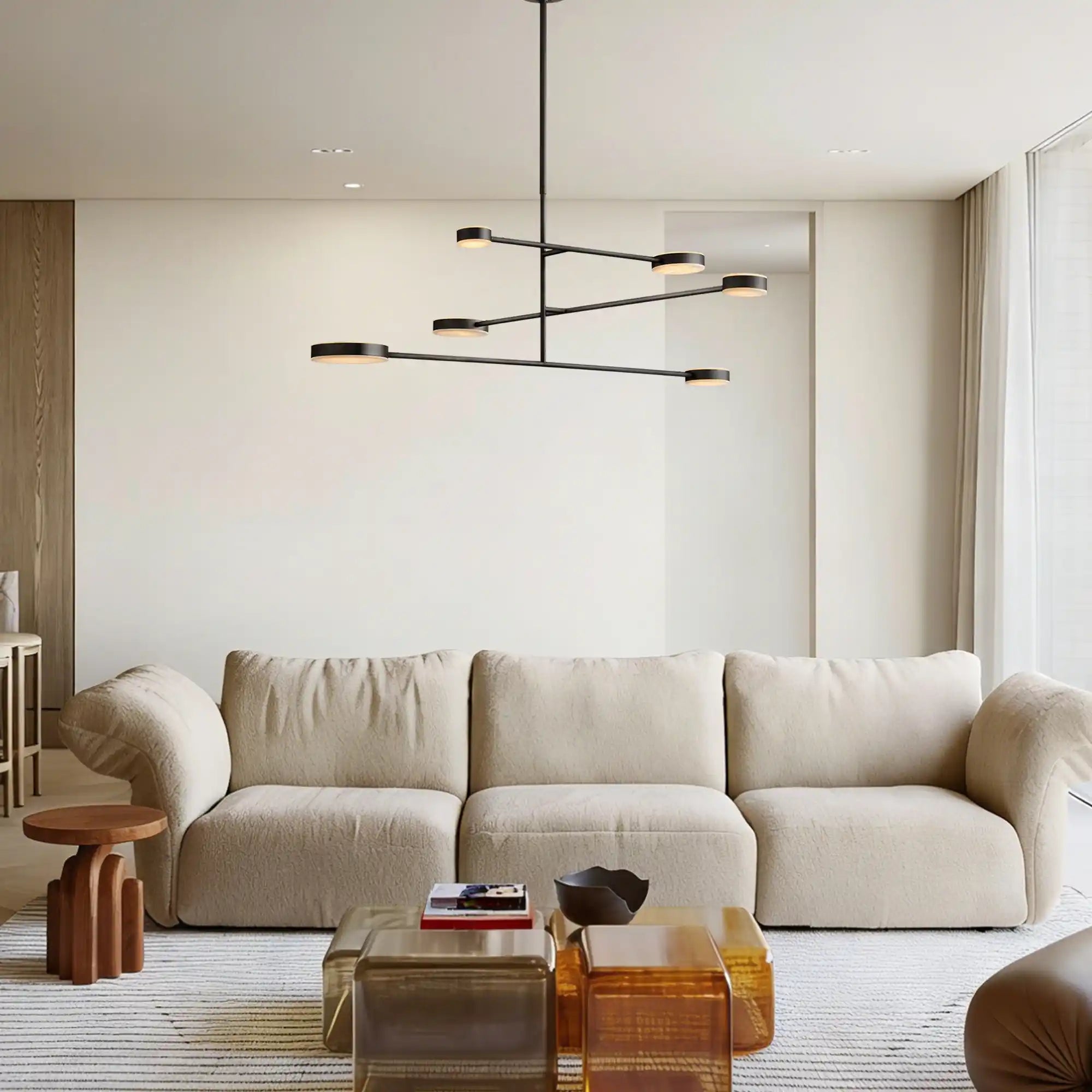 Large mobile chandelier creating a focal point in a contemporary living room