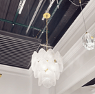 Antique Gold Frosted Glass Nine - Light Chandelier with Cascading Petal Design - Blushlighting