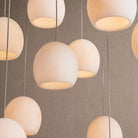 Arica Round Alabaster Chandelier Light in white - bedroom lighting