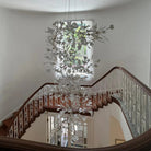 Artistic Tree Branch Pendant Light with Ceramic Ginkgo Leaves for High Ceilings in Hotel or Home-Chandeliers-Blushlighting