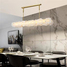 Carlos Alabaster Modern Snowflake Linear Chandelier Over Dining Table - Blushlighting