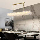 Carlos Alabaster Modern Snowflake Linear Chandelier Over Dining Table chandelier Kevin Studio Inc