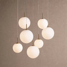 Casen Modern Round Chandelier - Hand-Blown Crackle Glass & Satin Brass LED Pendant Light - 7-Light 34''Matte OpalBlushlighting