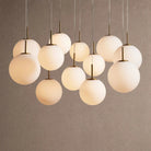 Casen Modern Round Chandelier - Hand-Blown Crackle Glass & Satin Brass LED Pendant Light - 12-Light 43''Matte OpalBlushlighting