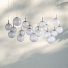Casens Modern Linear Chandelier - Hand - Blown Glass Globe Pendant Light for Dining Table & Kitchen Island - 65" 19 - LightCrackleBlushlighting