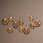 Casens Modern Linear Chandelier - Hand-Blown Glass Globe Pendant Light for Dining Table & Kitchen Island - 55" 10-LightBrown SugarBlushlighting