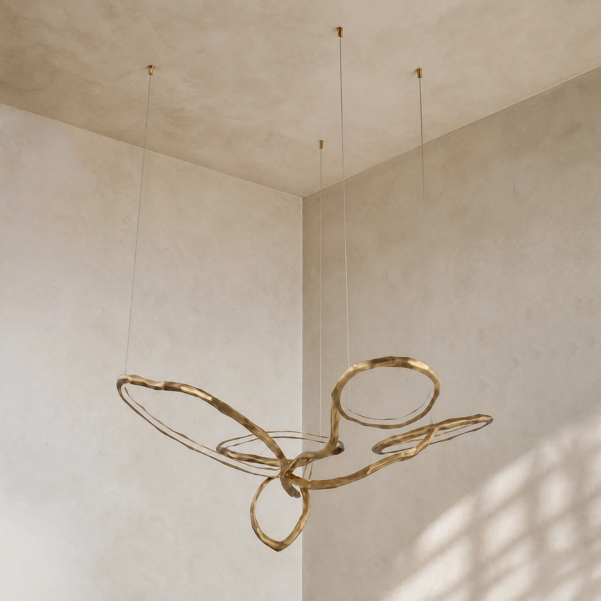 Cerchio Brass Ring Chandelier - styled in a room