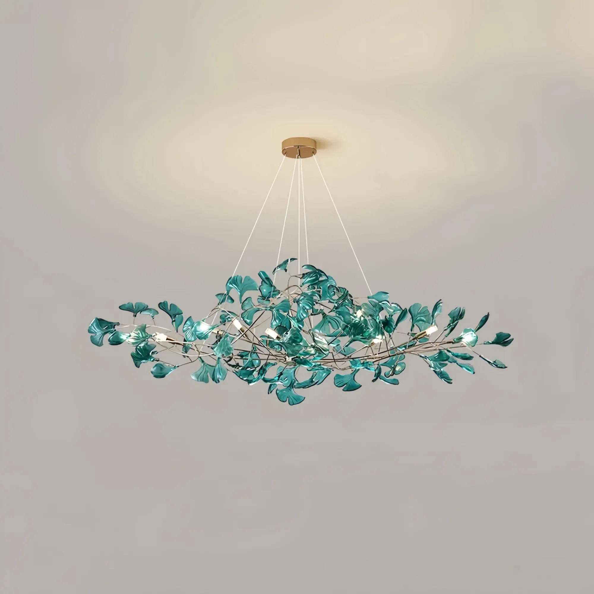 Decorative ceiling light fixture with leaf-like design on a plain background