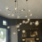 Covington Horizontal Globe Branching Bubble Chandelier - 5-LightBrassBlushlighting