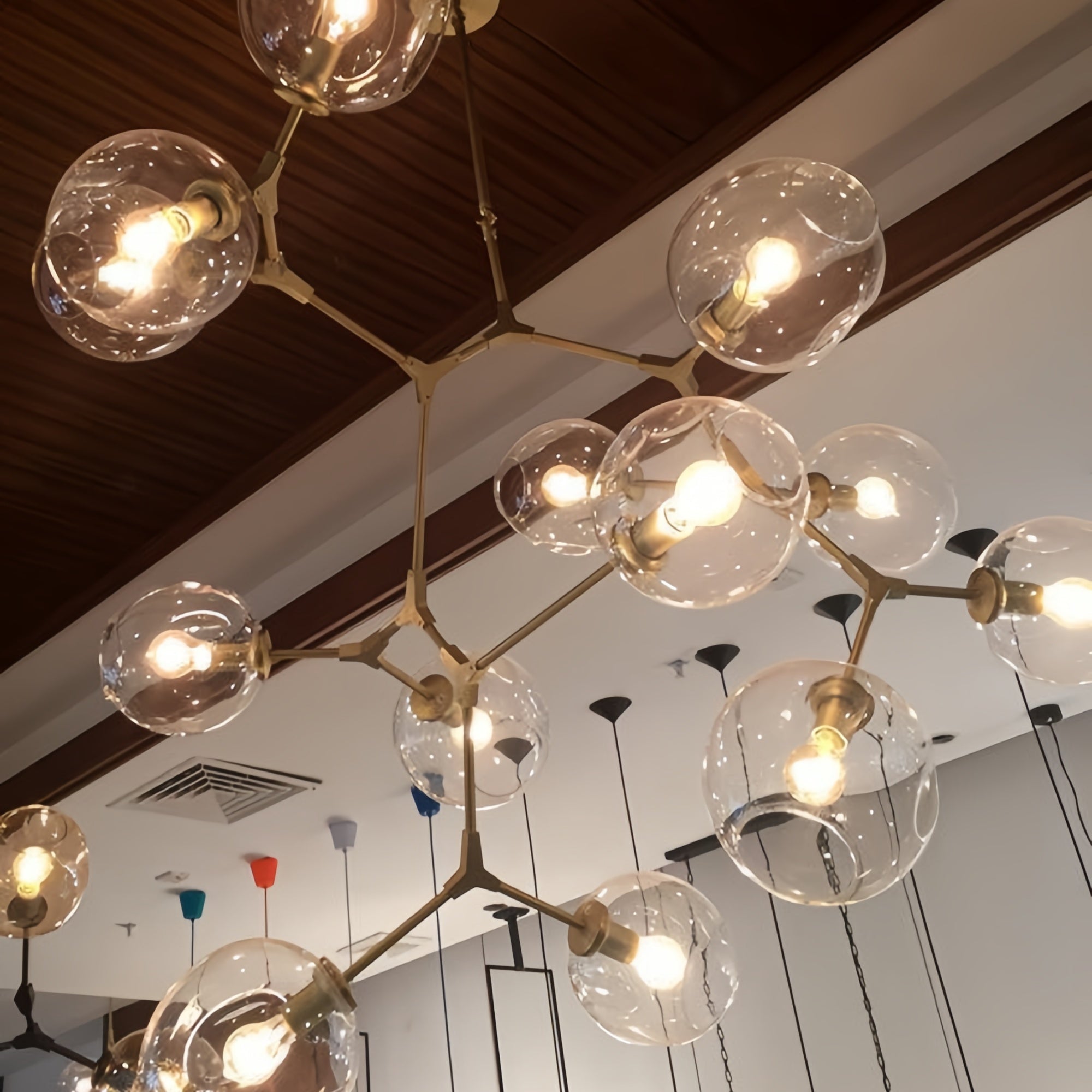 Covington Horizontal Globe Branching Bubble Chandelier - 5-LightBrassBlushlighting