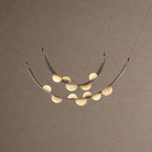 Dew Drops Alabaster LED Chandelier – Black White Warm Light - L 70.9″ x H 23.6″Black & WhiteWarm LightBlushlighting