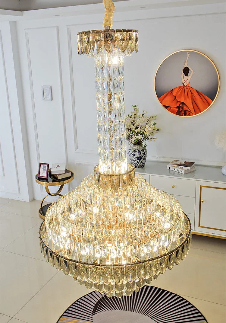 Elegant crystal chandelier illuminating a hotel-style foyer
