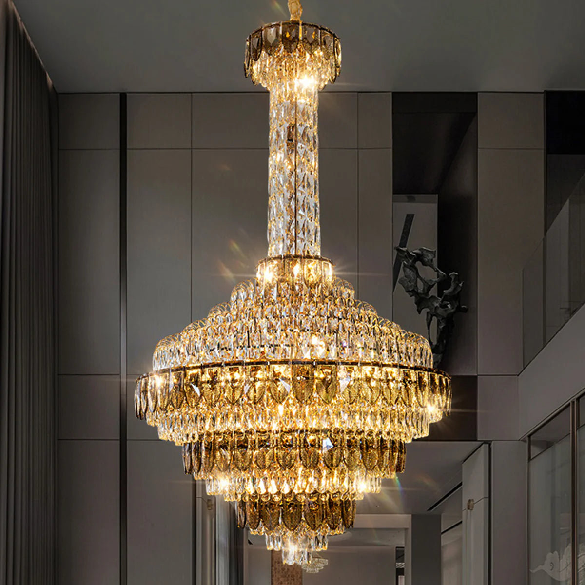 Large empire crystal chandelier installed in a grand foyer