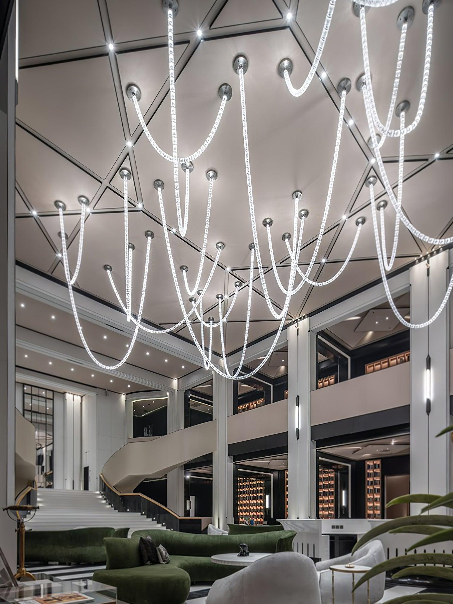 Gabriel Chandelier H - 55 Lights L 63″ x H 25″ / L 160cm x H 63.5cmClear & ChromeWarm LightBlushlighting
