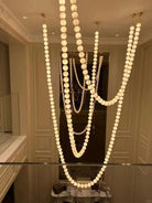 Halti Necklace Acrylic Chandelier - 114 Lights: Dia 31.5" x H 98.4"Gold & WhiteWarm LightBlushlighting