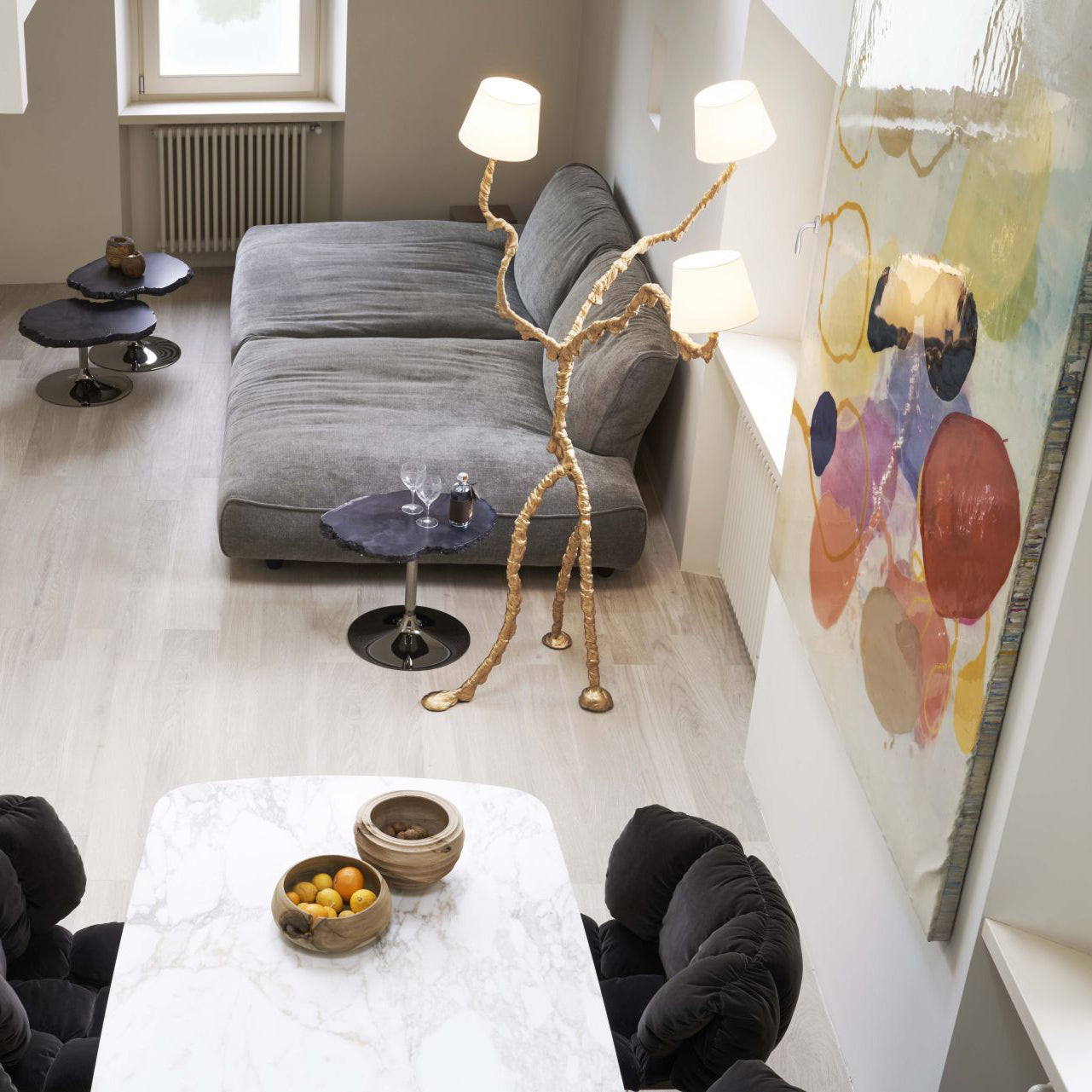 Brass tree-form floor lamp with tripod base and linen shades