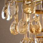 Jacqueline Round Chandelier - ∅ 32" x H 27"Gold & AmberBlushlighting