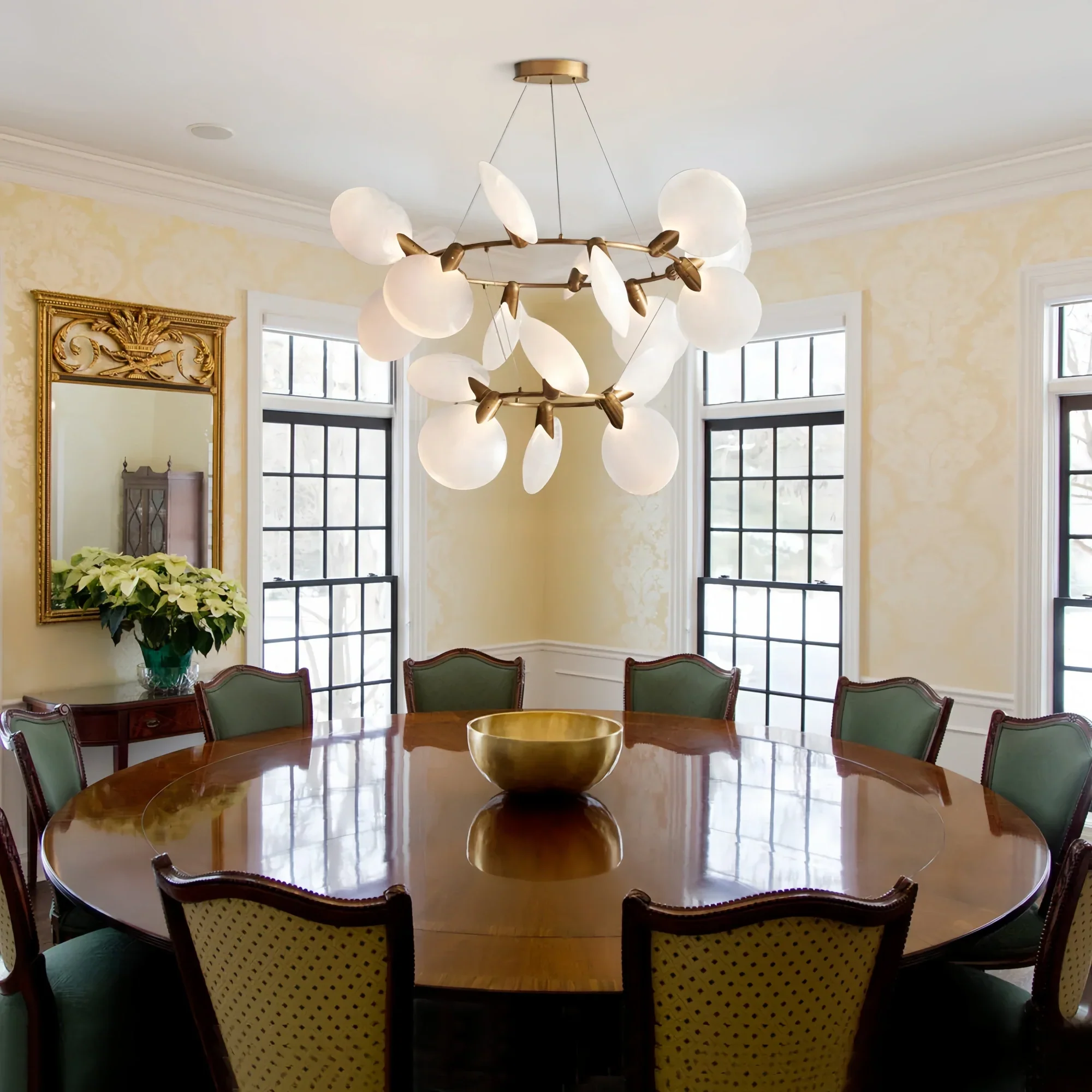 Dining room illuminated by Lyla 2-Tiered Halo Chandelier with soft ambient lighting