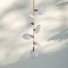 Lyla Pendant Light front view with alabaster shade and brass finish