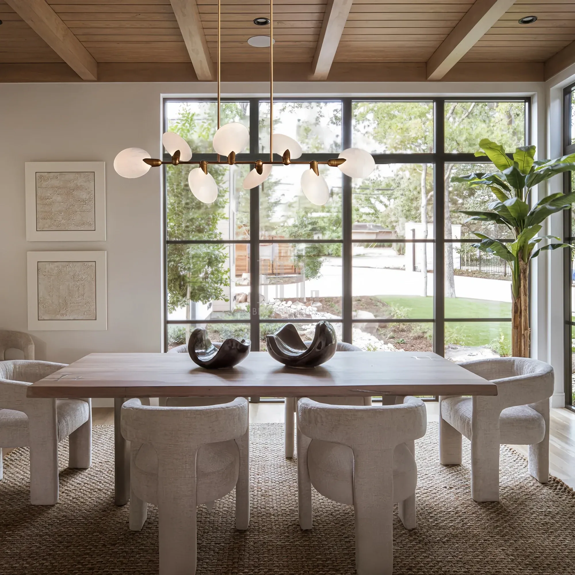 Lyla Linear Chandelier 74 inch modern linear chandelier hanging above dining table