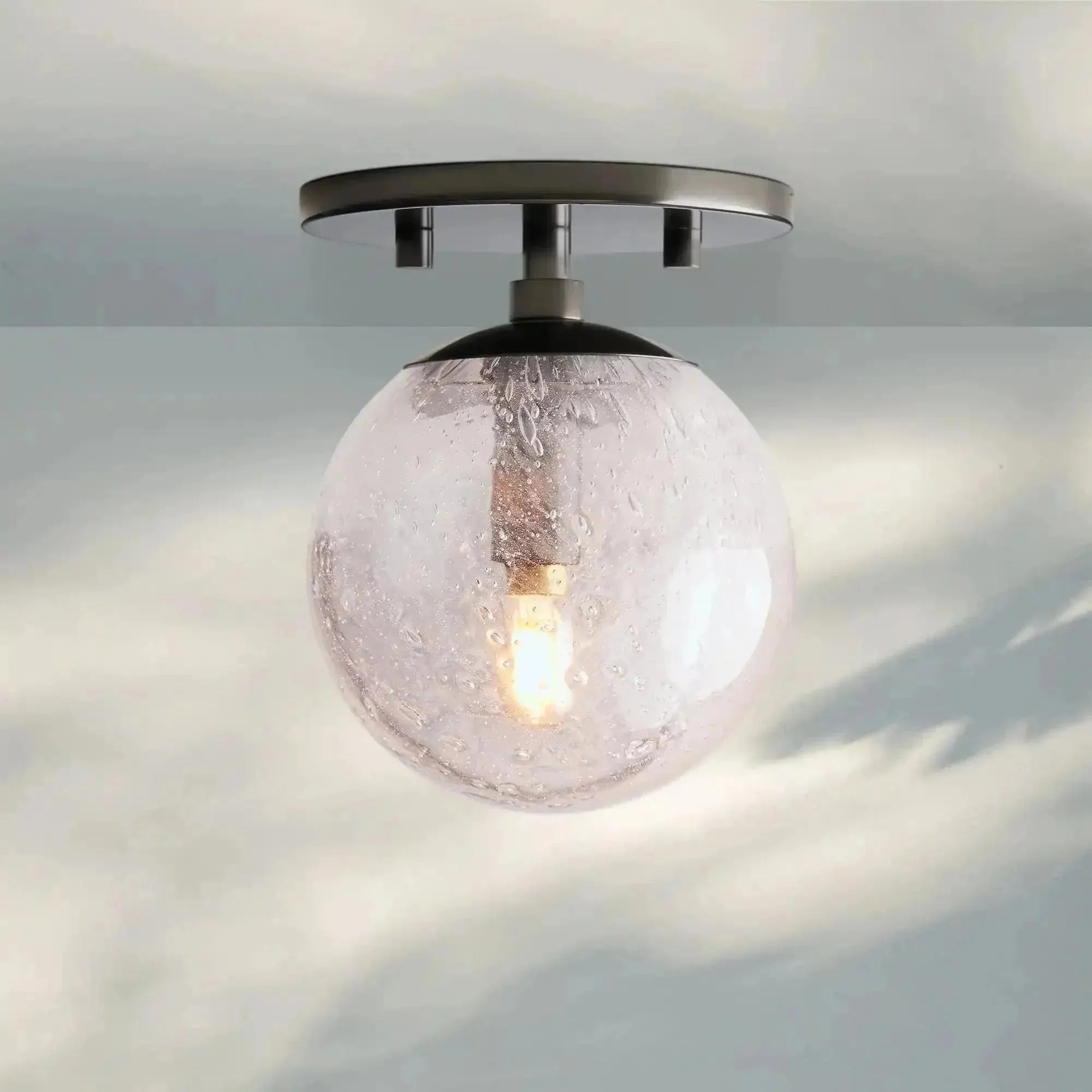 Mandoza Sconce - BronzeBlushlighting