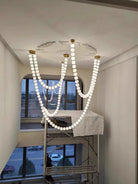 Modern Creative Pearl Necklace Chandelier - 12 Pearls/L78.7"With Metal DividerWarm LightBlushlighting