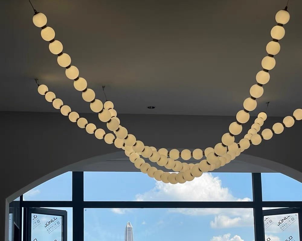 Modern Creative Pearl Necklace Chandelier - 12 Pearls/L78.7"With Metal DividerWarm LightBlushlighting