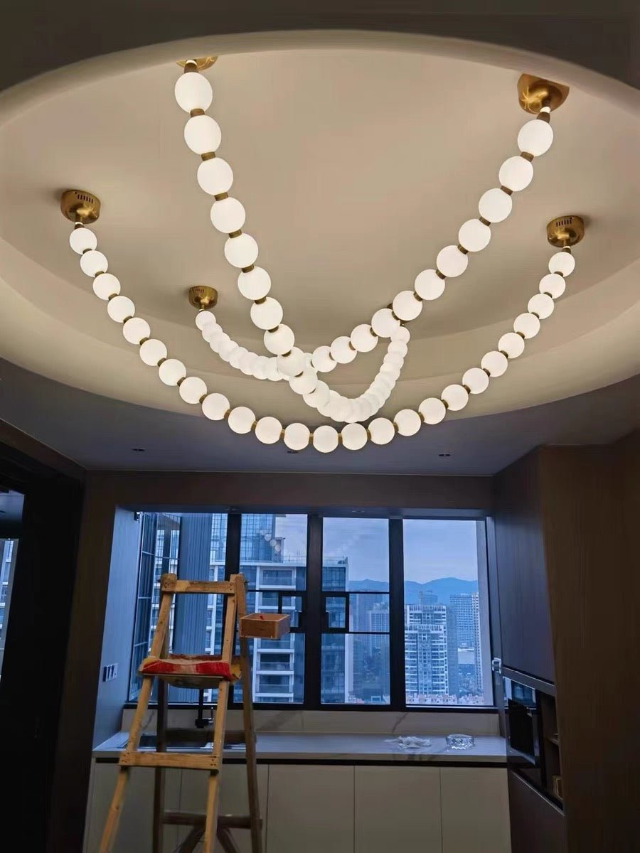 Modern Creative Pearl Necklace Chandelier - 12 Pearls/L78.7"With Metal DividerWarm LightBlushlighting