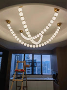Modern Creative Pearl Necklace Chandelier - 12 Pearls/L78.7"With Metal DividerWarm LightBlushlighting