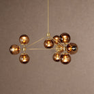 Modo Globe Chandelier - Brushed BrassCreamBlushlighting