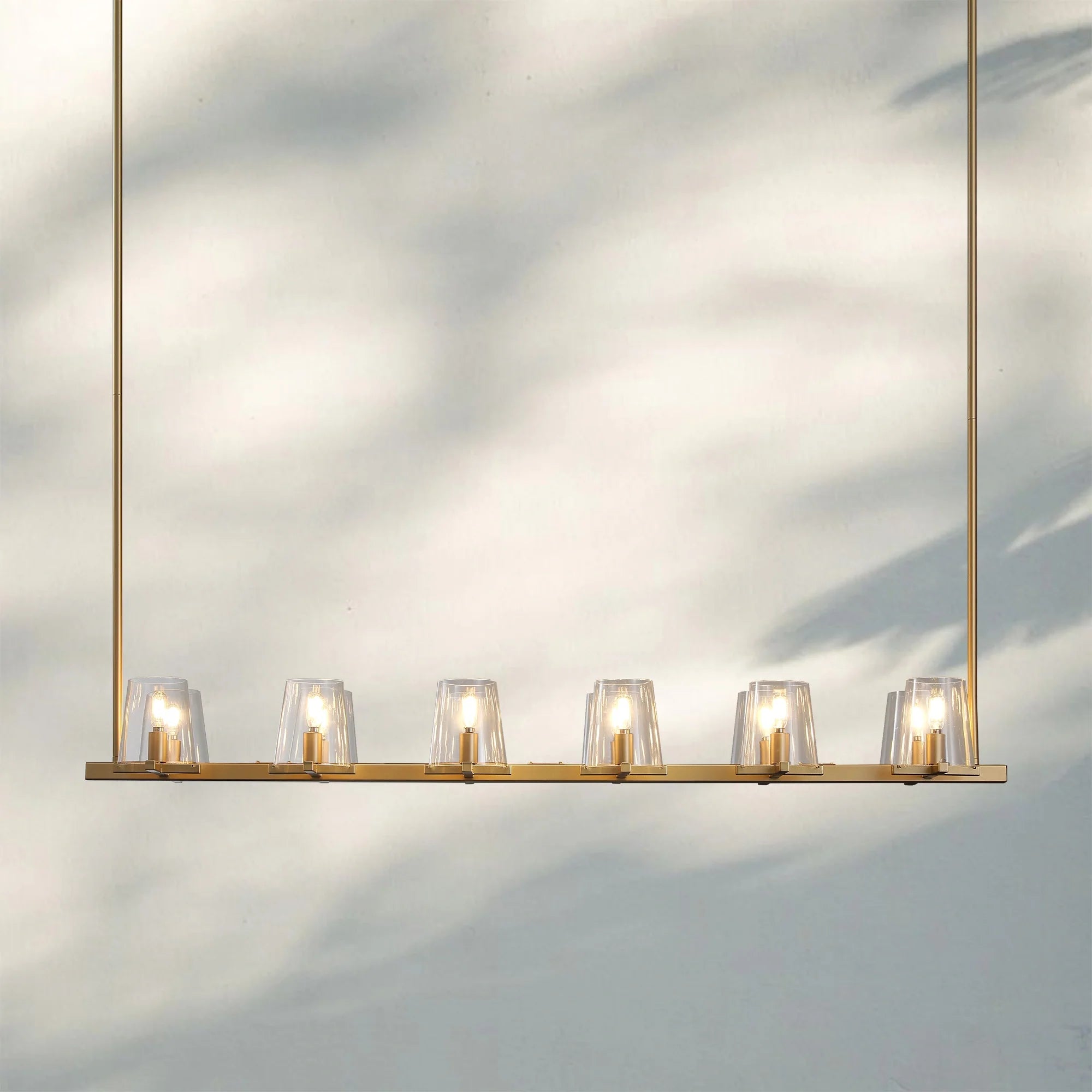 Pauilla Claar Glass Linear Chandelier-Linear 60" 12-Light-Lacquered Burnished Brass-