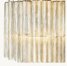 Chandelier with cylindrical glass shades on a white background