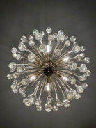 Decorative chandelier with crystal-like beads on a dark background